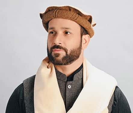 Handmade rolled-wool pakol hats in the natural colours of the wool
