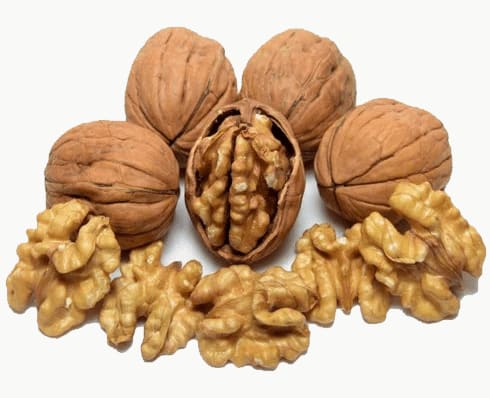 Shelled walnuts in a pile